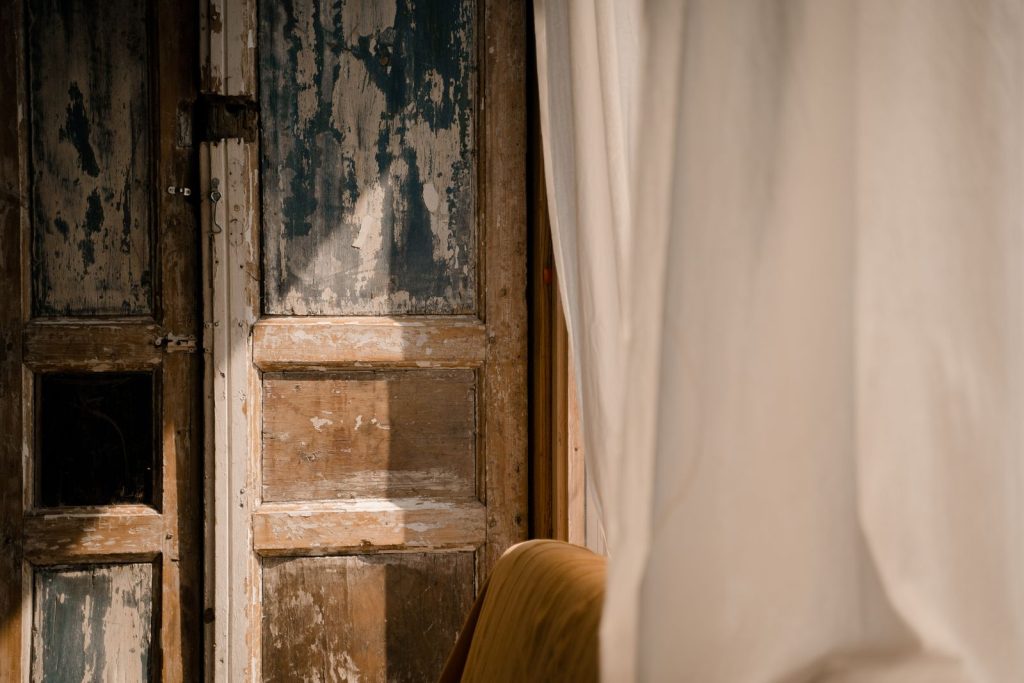 Sunlit wooden front door
