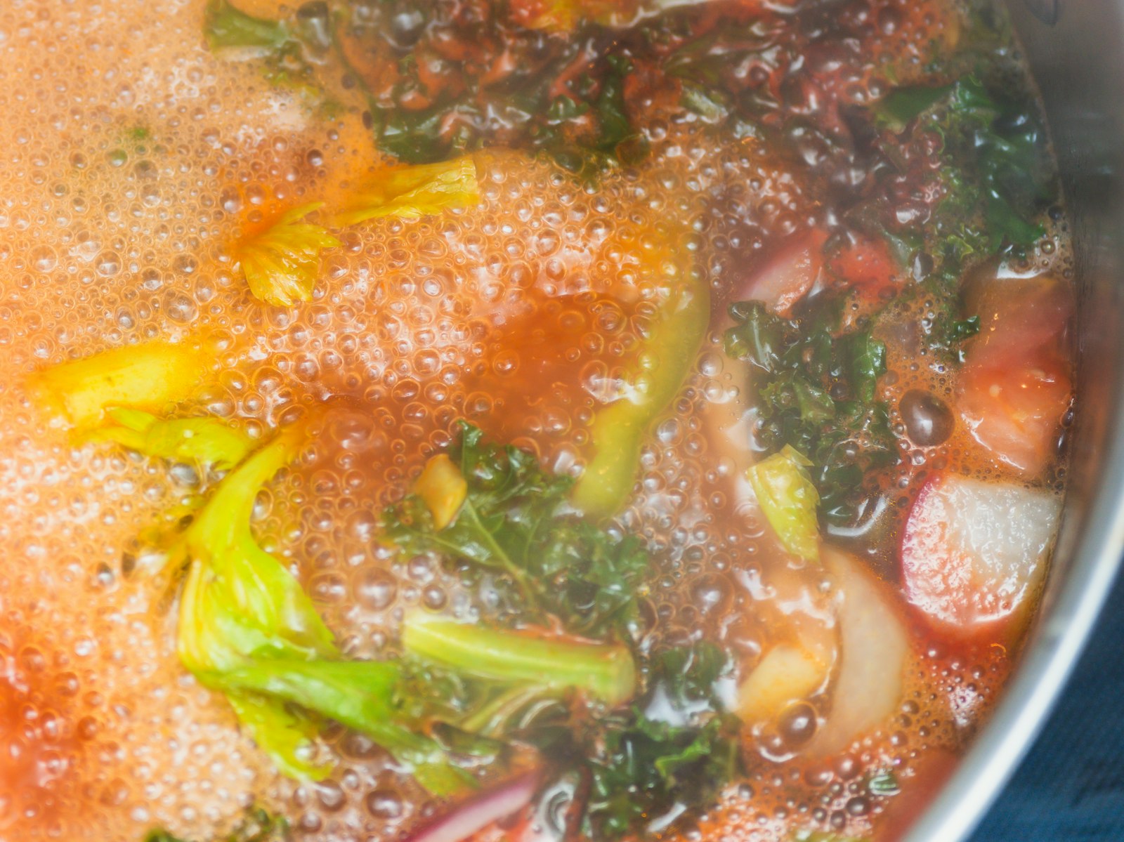 Vegetable broth simmering in a pot