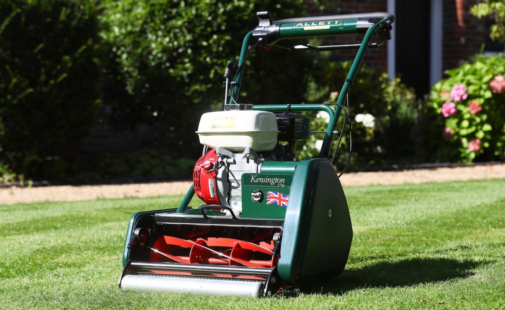 Cylinder lawn mower on a manicured lawn