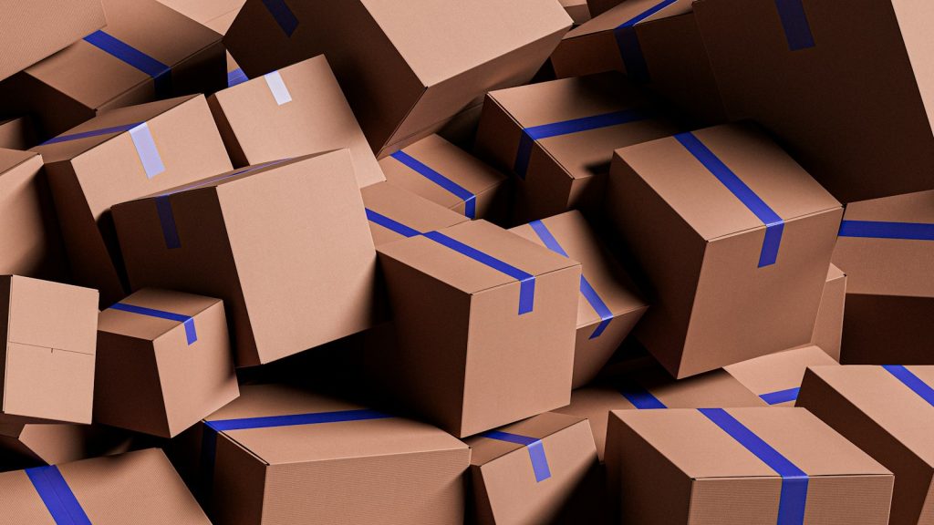Stack of reusable cardboard shipping boxes