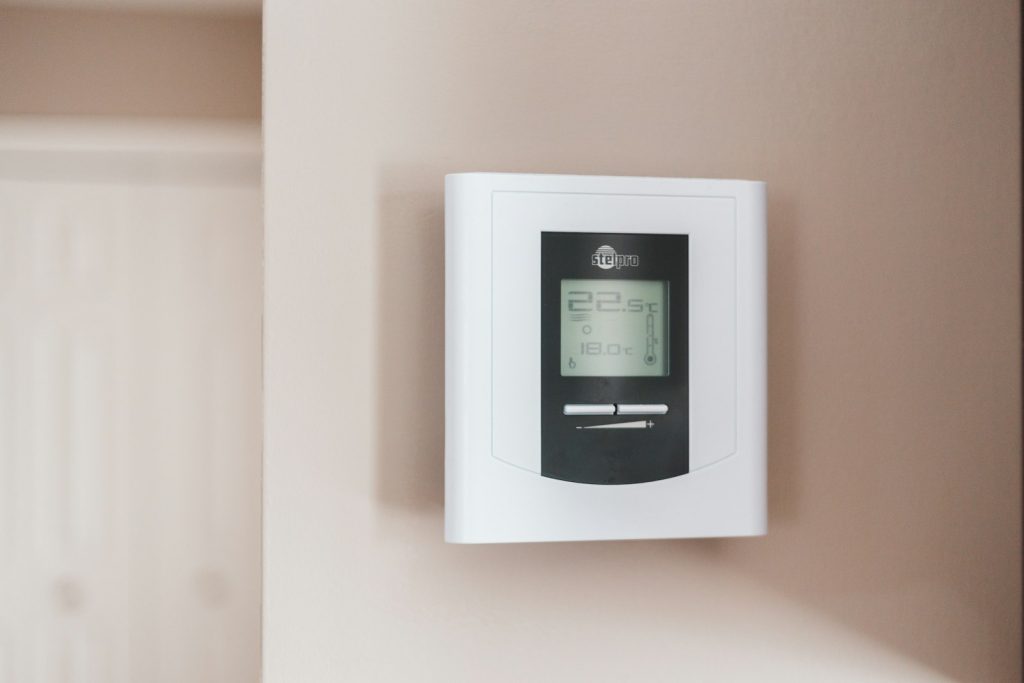 Programmable wall thermostat
