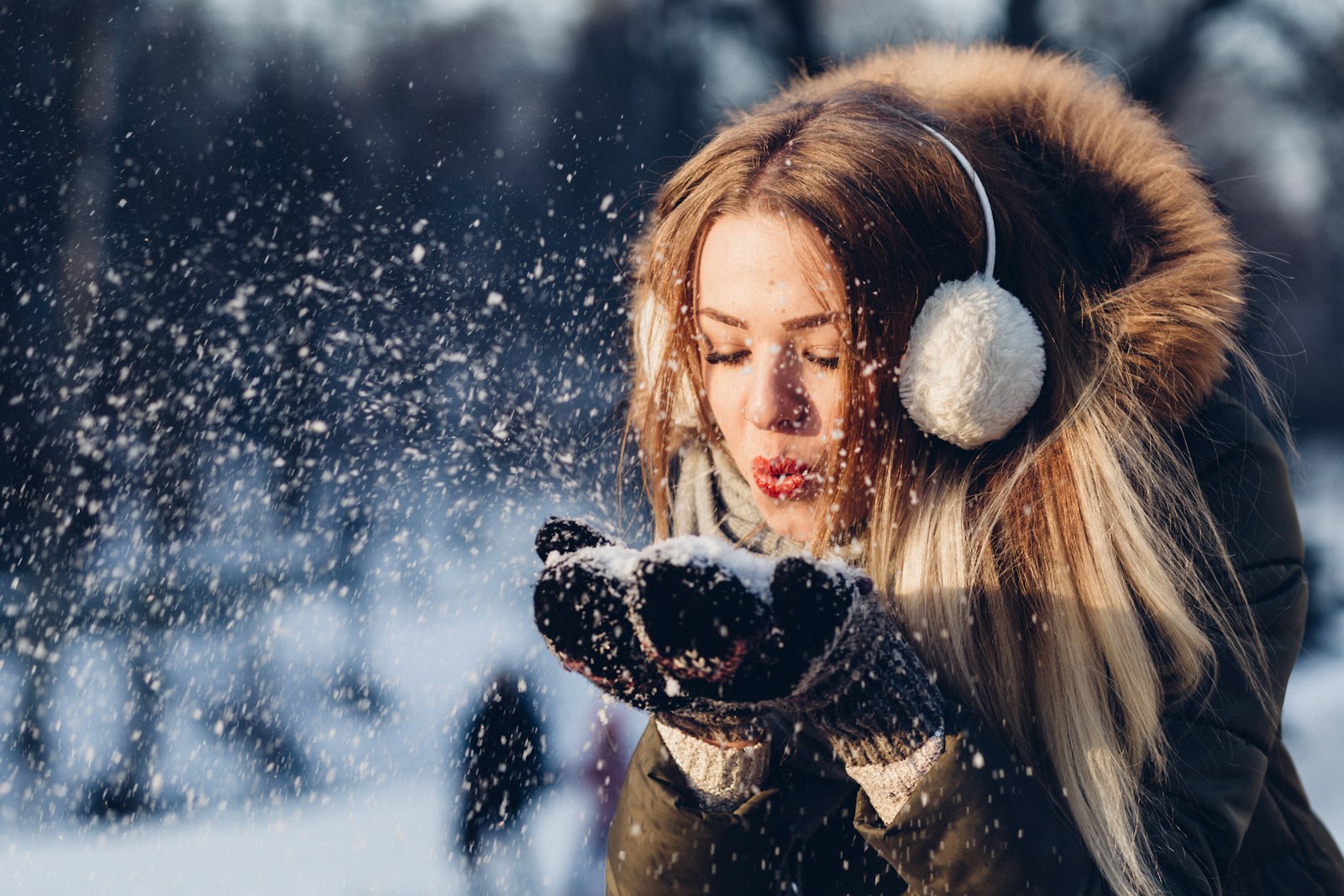 Person bundled up outdoors on a snowy winter day