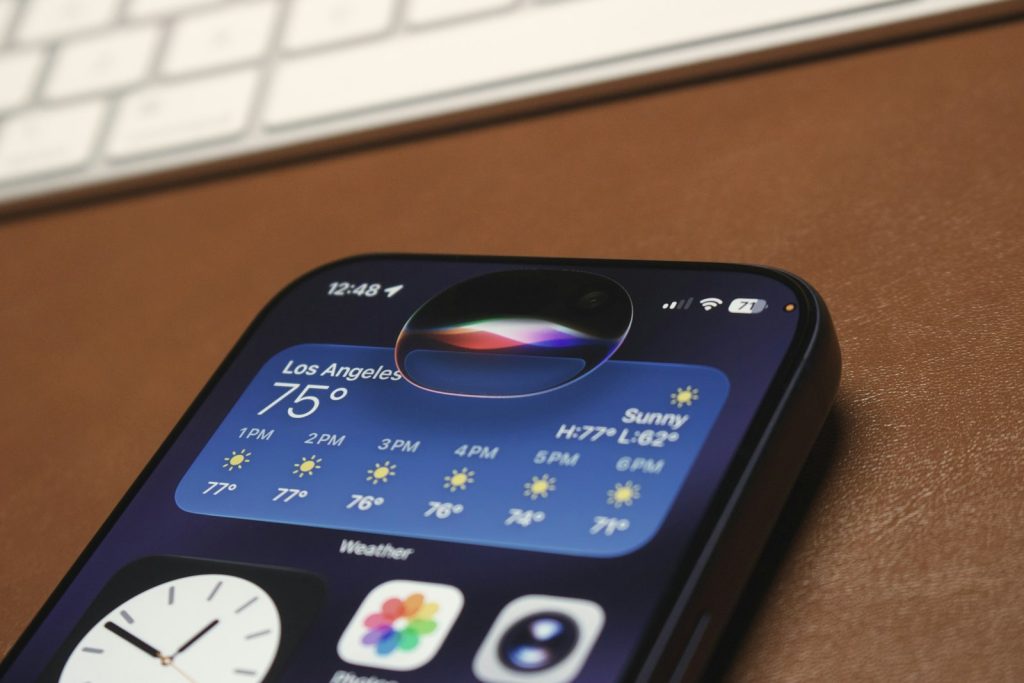 Smartphone showing a weather app forecast